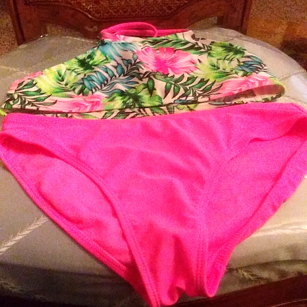 A cute little pink little girls swimsuit size 10-12